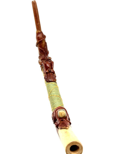 tepi-with-owl-and-polished-stone-in-textile-detail