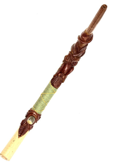 tepi-with-owl-and-polished-stone-in-textile-detail